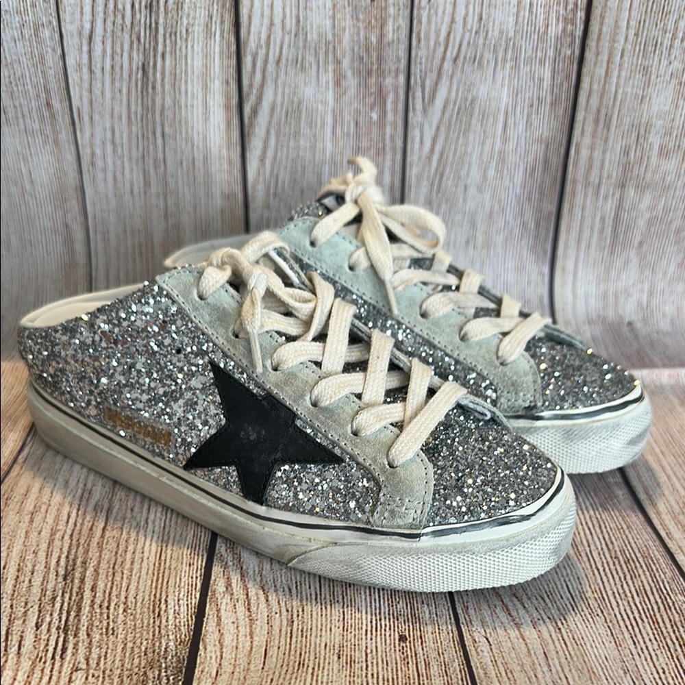 Golden goose Super-Star Sabot in silver glitter with black leather star